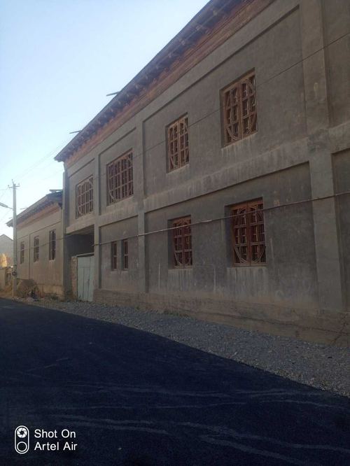Plot with a house for sale